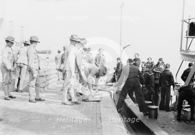 Loading MEADE, 1913. Creator: Bain News Service.