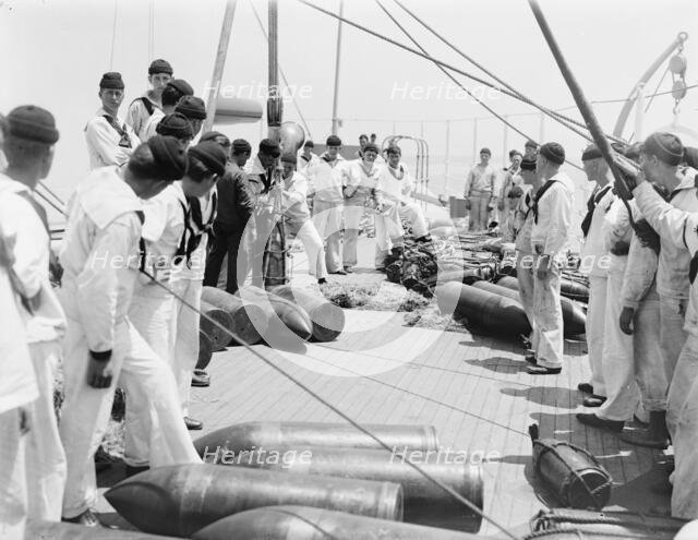 U.S.S. Kentucky, taking on ammunition, 1900 or 1901. Creator: Unknown.