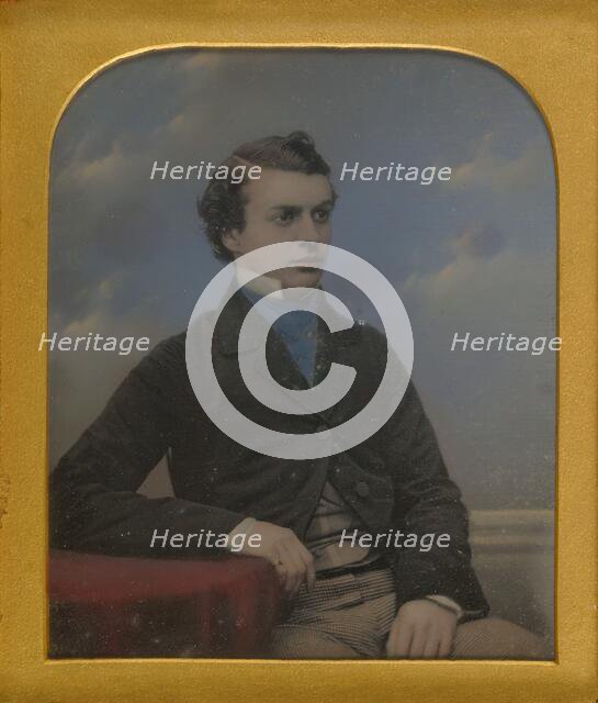 Portrait of a Young Man Seated at Table, about 1852. Creator: Richard Beard.