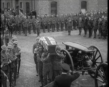 British Soldiers Carrying the Coffin of a British Soldier Draped in the Union Flag, 1920. Creator: British Pathe Ltd.