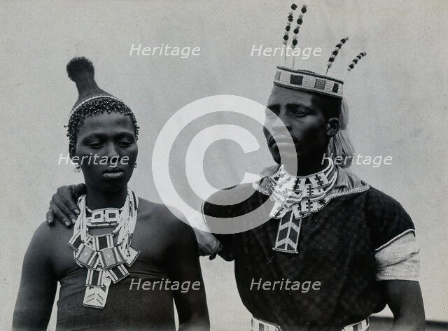 An African man and woman embracing, c1900. Creator: Unknown.