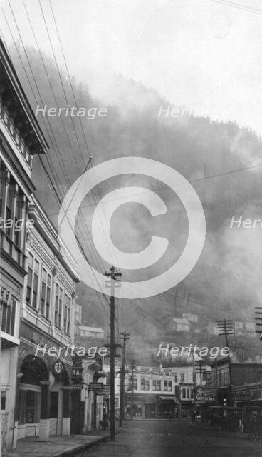 Clouds descending into the main street, between c1900 and 1923. Creator: Unknown.