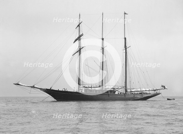 The auxiliary schooner 'La Cigale' at anchor, 1913. Creator: Kirk & Sons of Cowes.