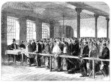 The Cotton Famine: distributing tickets for bread, soup, meat, meal, coal etc, Manchester, 1862. Creator: Unknown.