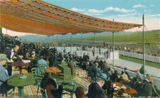 'Watching the Races in front of Club House, Agua Caliente Jockey Club', c1939. Artist: Unknown.