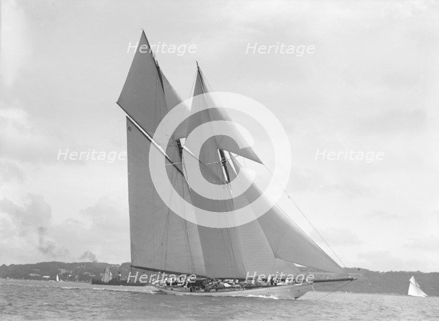 The 250 ton schooner 'Germania' sails close-hauled, 1911. Creator: Kirk & Sons of Cowes.