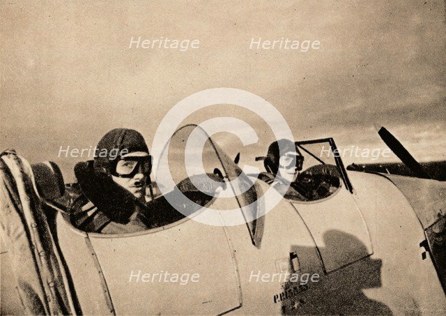 Starting on an instructional flight in a Miles Magister. The pupil is in the rear cockpit', 1940. Artist: Unknown