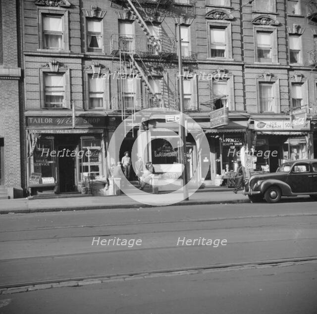 A tenament house in Harlem, New York, 1943. Creator: Gordon Parks.