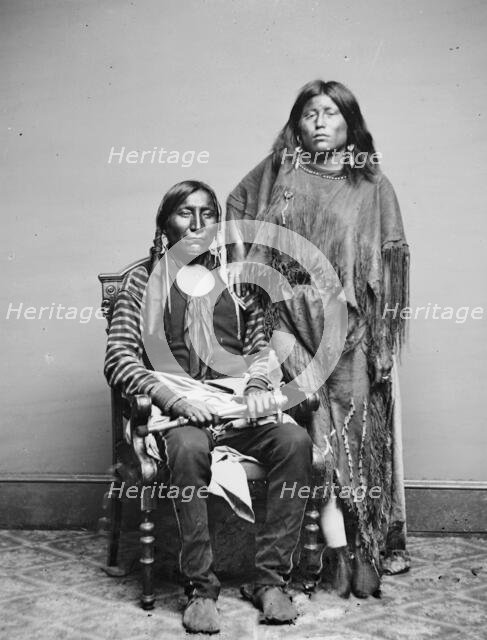 Lone Wolf and his wife Etla, Kiowa Indians, between 1855 and 1865. Creator: Unknown.