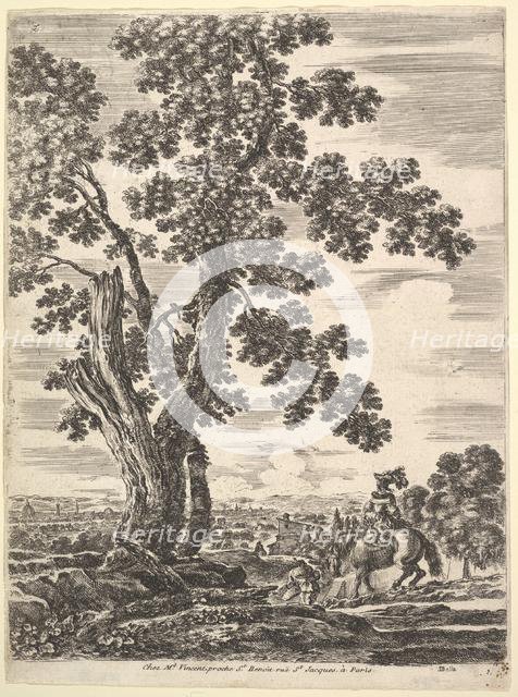 A woman on horseback seen from behind descending a hill to the right, a large tree ..., ca. 1652-57. Creator: Stefano della Bella.