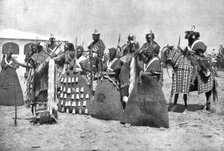 Distant Fronts, In Cameroon; Escort of the lamido of Rey Bouba,..., 191 Creator: Unknown.