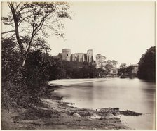 A view looking along the River Tees towards the ruins of Barnard Castle, 1860s. Creator: James Mudd.