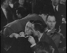 Bruno Richard Hauptmann Speaking To Attorney C. Lloyd Fisher During His Trial in the Lind..., 1930s. Creator: British Pathe Ltd.