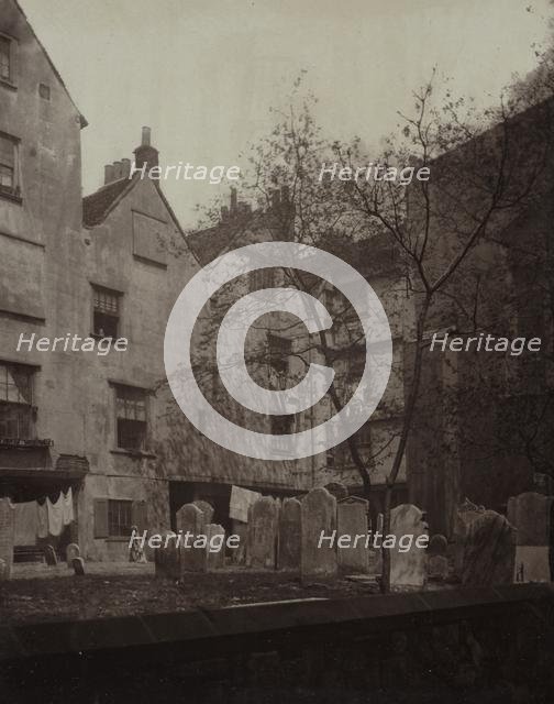 St. Bartholomews: The Churchyard Looking towards Cloth Fair, 1877. Creator: Alfred H. Bool (British); John Bool (British), and ; album issued by The Society for Photographing the Relics of Old London; Henry Dixon (British (modern), 1820-1893).