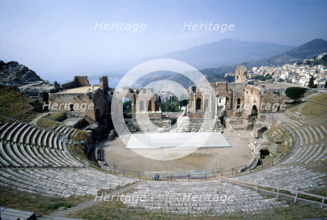GreekGreek Ampitheatre, seashore and Mt Etna, Taormina, Sicily, 3rd century, (c20th century).  Artist: Unknown.