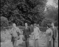 British Prime Minister Stanley Baldwin Walking in the Garden at Chequers, the Country House..., 1924 Creator: British Pathe Ltd.