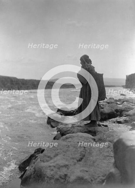 The fish carrier-Wisham (i.e. Wishram), c1910. Creator: Edward Sheriff Curtis.