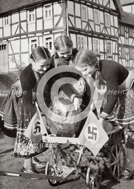 Farm bread being sent to the poor people in the city, Germany, 1936. Artist: Unknown