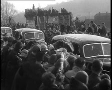 Crowds Watching a Parade of Cars, 1936. Creator: British Pathe Ltd.