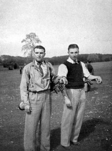 Stanley Matthews and Eddie Hapgood pause between shots during a round of golf, 1945. Artist: Unknown