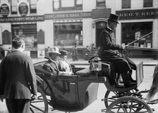 John Lind, Governor of Minnesota, in Carriage with Mrs. Lind, 1914. Creator: Harris & Ewing.