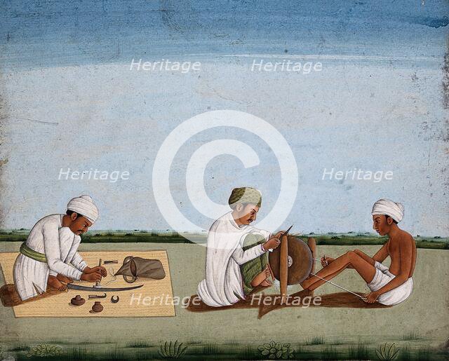 Two men sharpening a knife whilst the third prepares the blade on a sword, (between 1800 and 1899?). Creator: Unknown.