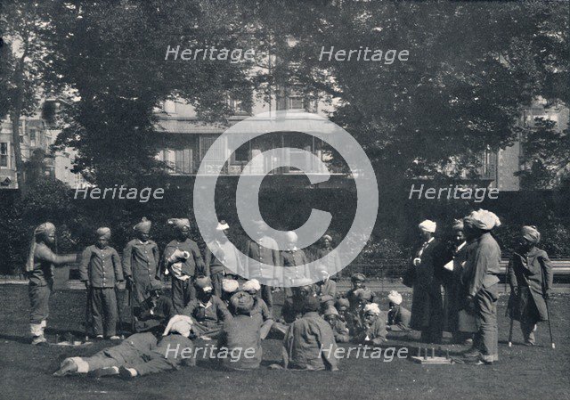 'Convalescent Indian Soldiers Playing Quoits on the Eastern Lawns', c1915, (1939). Artist: Unknown.
