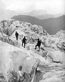 Climbing through the Bossons icefall on the way up Mont Blanc, Switzerland, early 20th century. Artist: Unknown