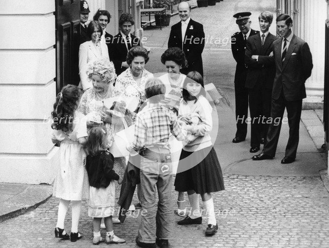 The Queen Mother receives 80th birthday presents from children, Clarence House, London, 1980. Creator: Unknown.