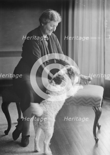 Alanson, Bertram, Mrs., with dog, portrait photograph, between 1927 and 1937. Creator: Arnold Genthe.
