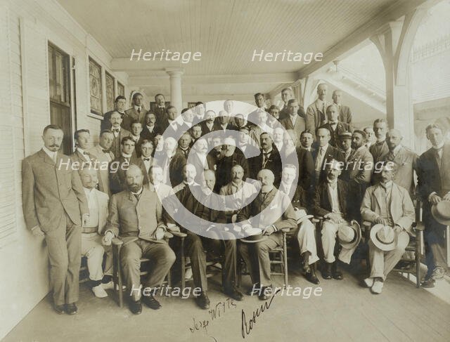 Russians & newspaper men - Sergei Witte, Baron Rosen with their suite and newspaper men, 1905. Creator: Perry Enoch Conner.