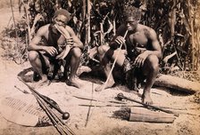 Two African men smoking pipes, 19th century. Creator: Unknown.