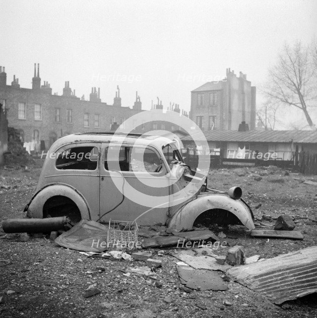 Abandoned car, London, 1960-1965. Artist: John Gay