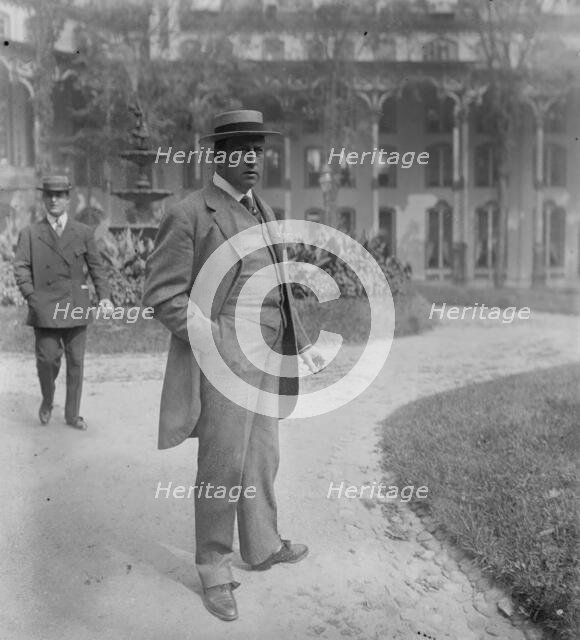 Wm. Barnes, Jr., standing outside in park, 1910. Creator: Bain News Service.