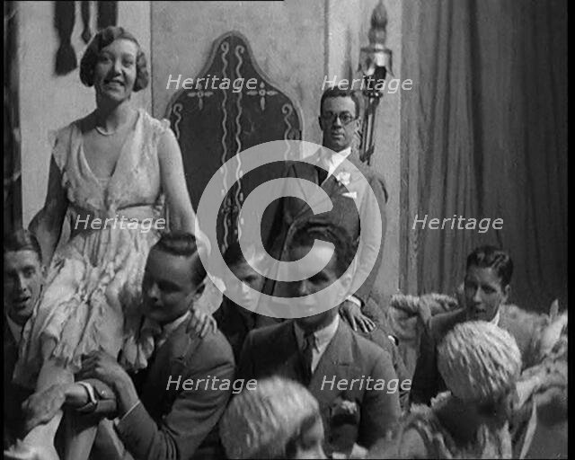 Scene from a Stage Show: Male and Female Civilians Dancing on a Stage in a Routine with..., 1929. Creator: British Pathe Ltd.