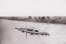 U.S. Monitor "Casco" on James River, taken from a lookout tower on bank., 1861-65. Creator: Unknown.