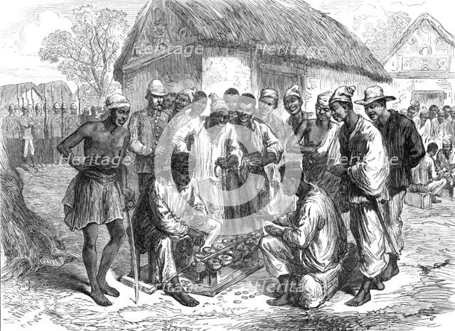 Sketches of the Ashantee War by our special artist: native soldiers playing at "Warry", 1874. Creator: Unknown.
