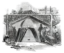 One of the Retorts for Burning the Turf into Charcoal, 1850. Creator: Smyth.