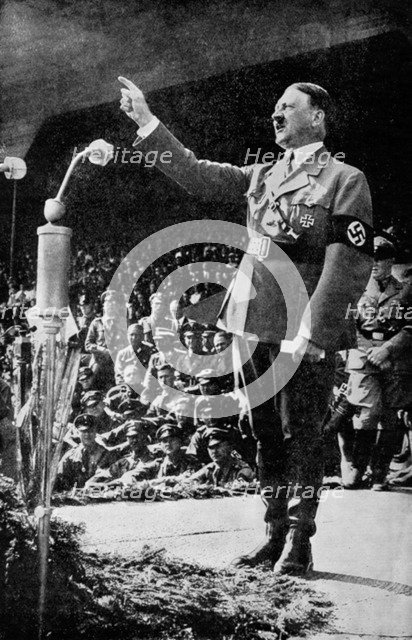 Adolf Hitler addressing a rally, c1930s. Artist: Unknown