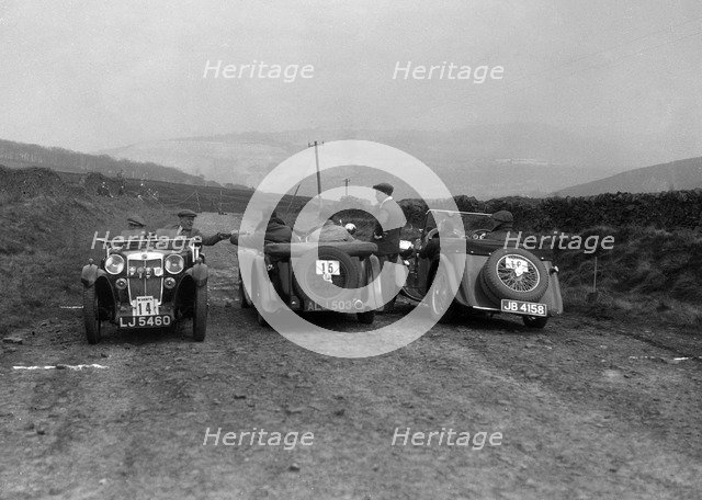 MG F type, Wolseley Hornet and MG Magnette at the Sunbac Inter-Club Team Trial, 1935. Artist: Bill Brunell.