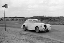 Ray Playford driving a Healey Elliott, at Snetterton Circuit, Norfolk, 1953. Creator: Unknown.