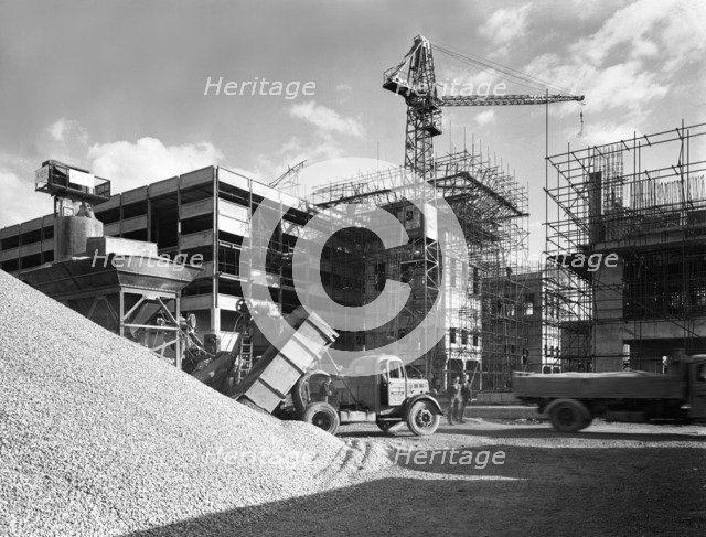 Early 1950s Bedford M Tipper delivering aggregates to a building site, South Yorkshire, July 1954. Artist: Michael Walters