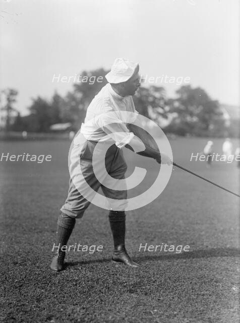 Joseph Edward Davies, Chairman, Federal Trade Commission. Playing Golf, 1917. Creator: Harris & Ewing.