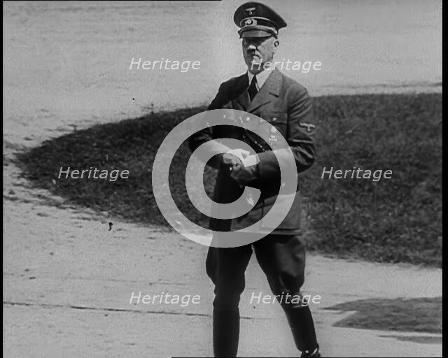 Adolf Hitler Walking Away from the 1918 Armistice Train Car at Compiegne After the French..., 1940. Creator: British Pathe Ltd.