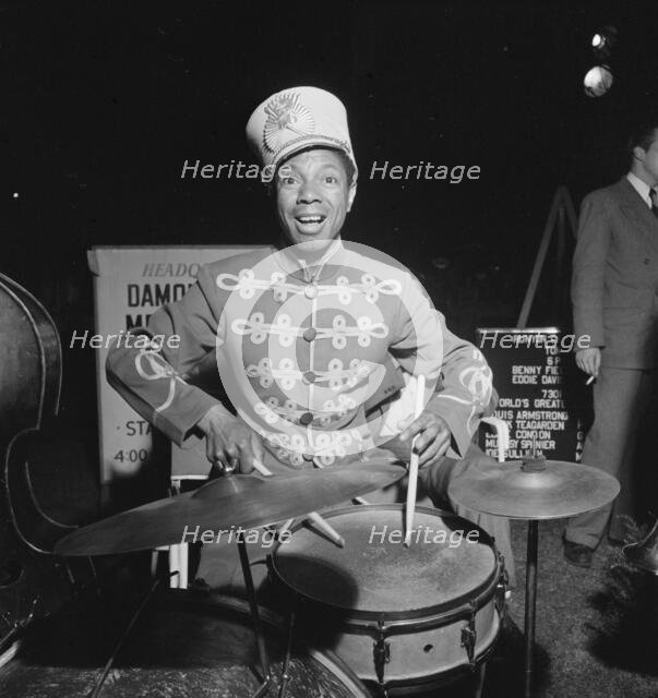 Portrait of Kaiser Marshall, Times Square(?), New York, N.Y., ca. July 1947. Creator: William Paul Gottlieb.