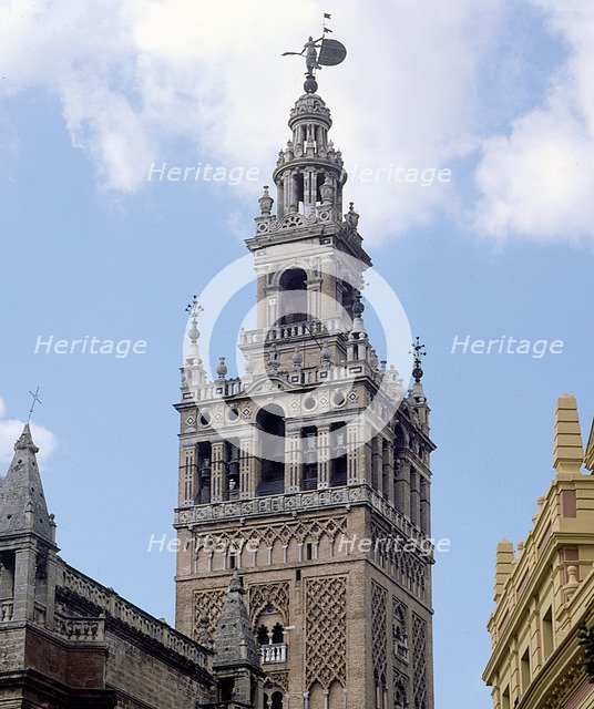 Giralda Tower in Seville, two-thirds are from 12th century in Almohad style and the top was finis…