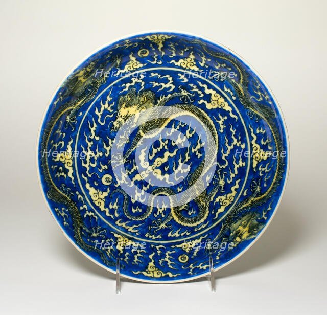 Dish with Dragons amid Clouds, Chasing Flaming Pearls, Qing dynasty, Kangxi reign mark (1662-1722). Creator: Unknown.