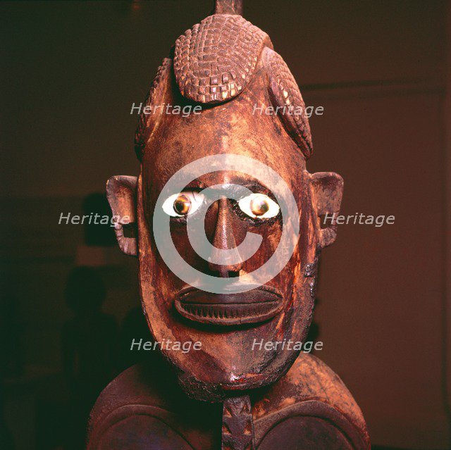 Wooden figure from New Ireland, Melanesia. Artist: Unknown.