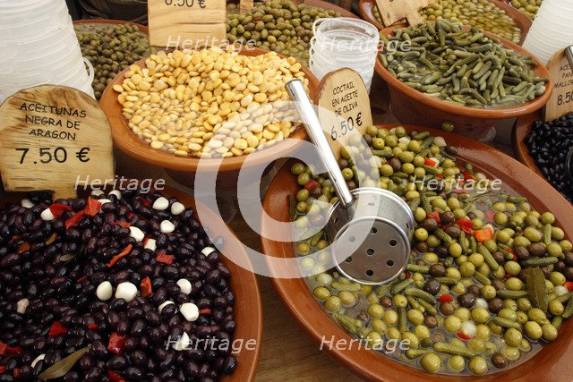 Market stall, Mallorca, Spain. Olives, beans and gherkins.