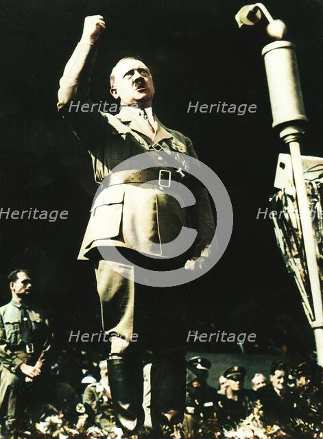 Adolf Hitler addressing a Nazi rally at Nuremberg, Germany, 1930s.  Creator: Unknown.